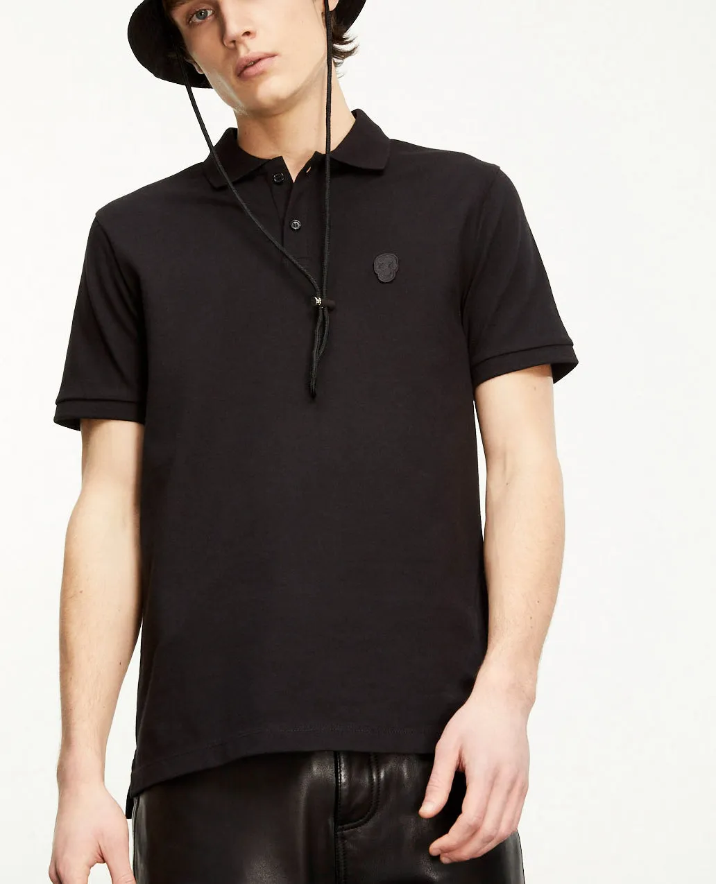 Polo noir col classique à détail brodé