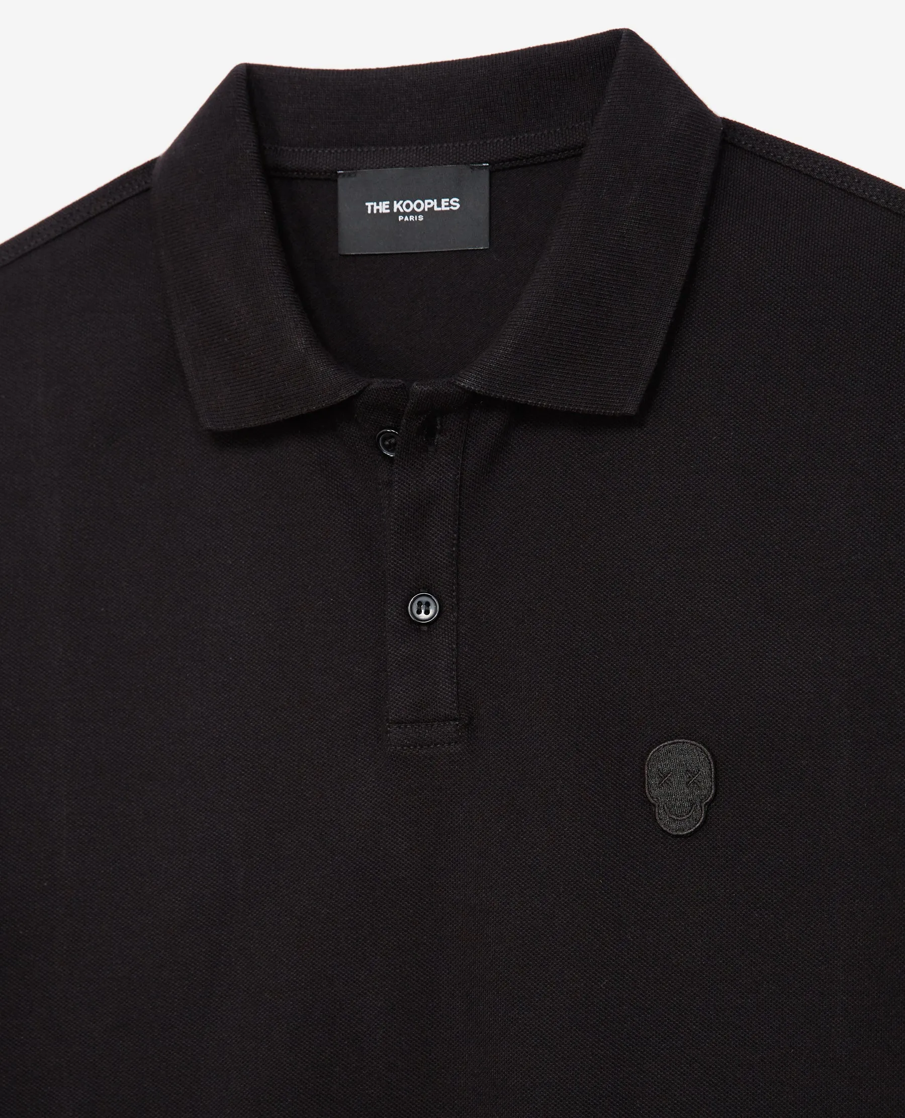 Polo noir col classique à détail brodé